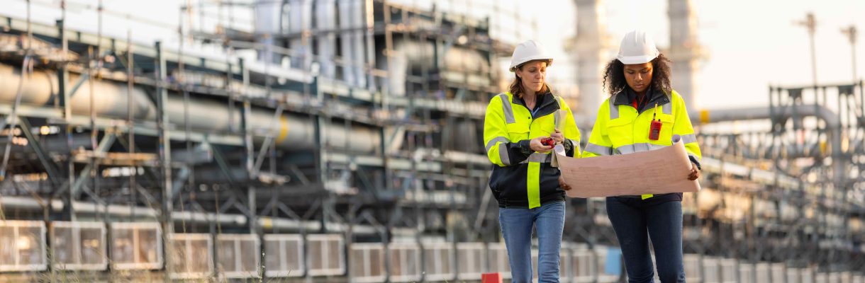 two-engineers-reviewing-blueprint-plans-at-industr-2024-12-07-23-30-53-utc (1)